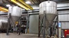 2 - 24' high stainless steel tanks.  (40,000gallons)
